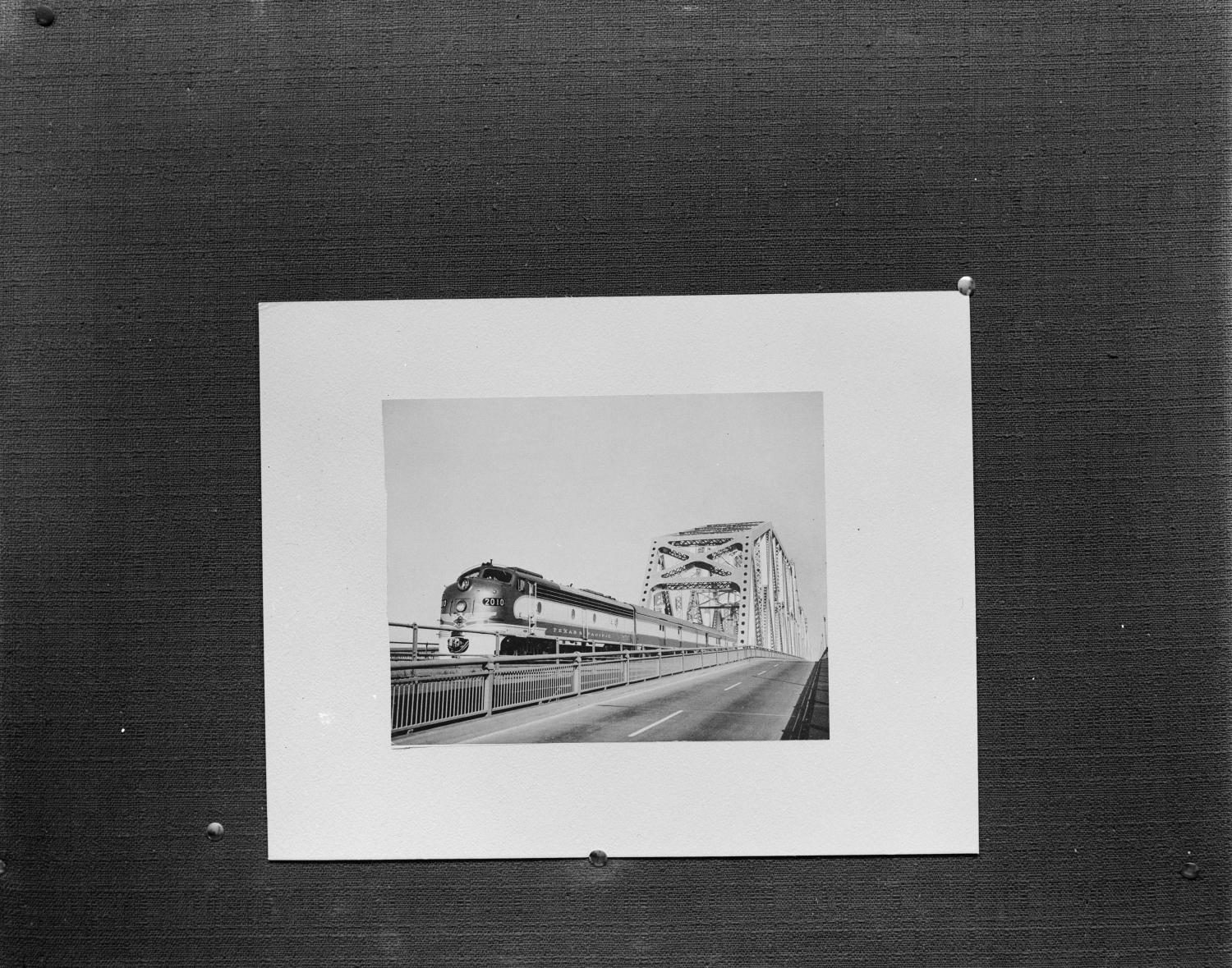 Train next to a highway 2 of 2