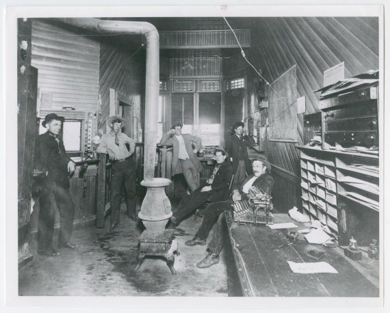 Men Inside the Texas and Pacific Railway Depot