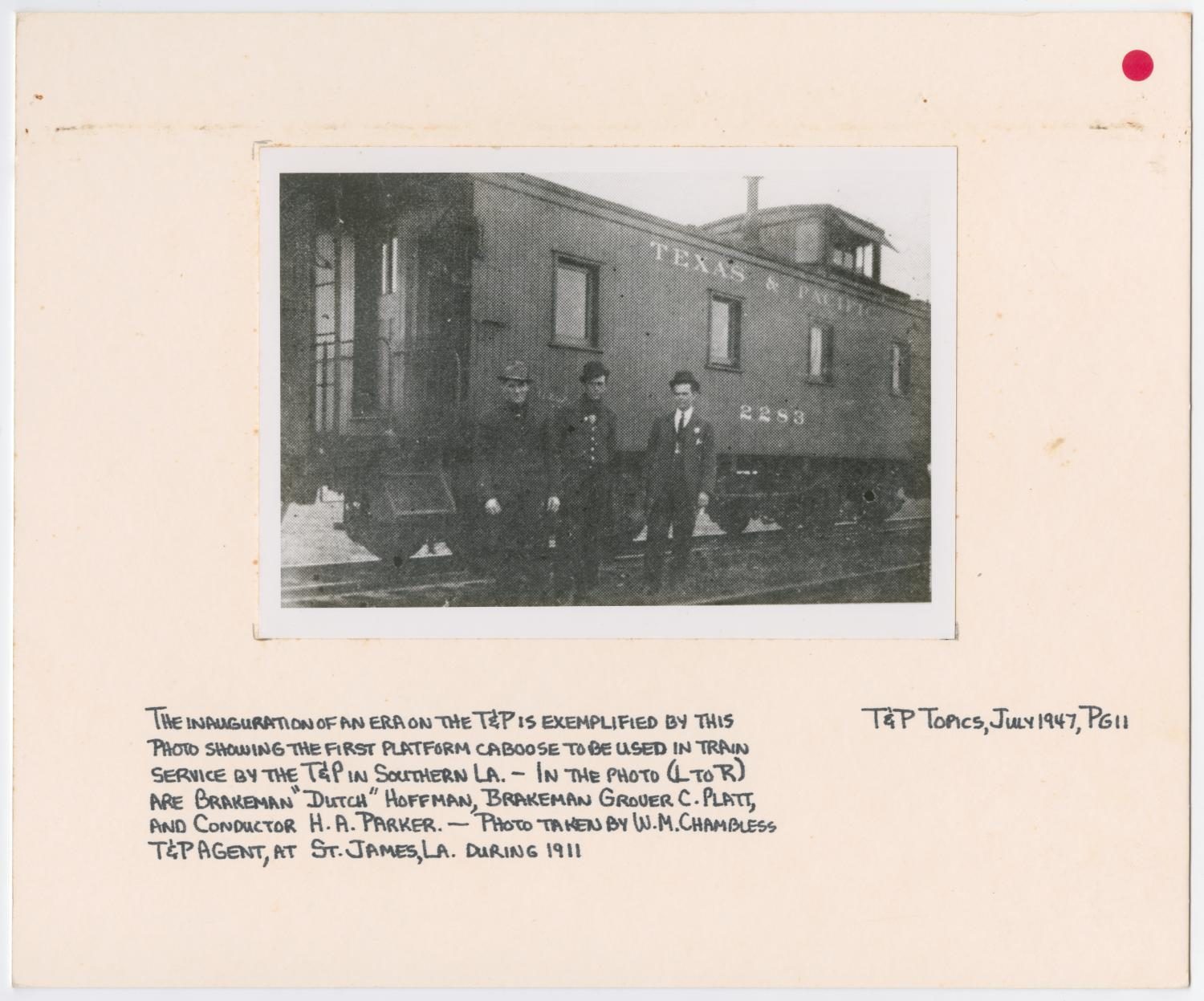 Men Posing with a Platform Caboose