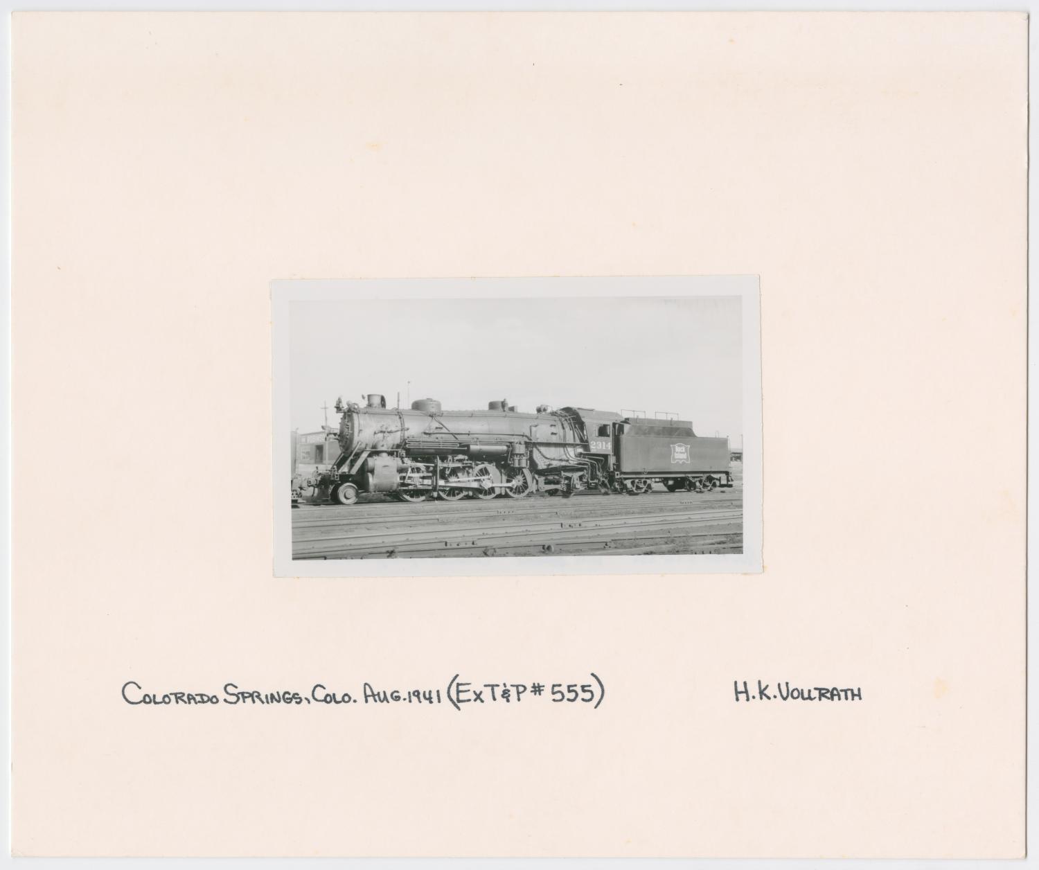 Side View of Train Engine #2314 and Car