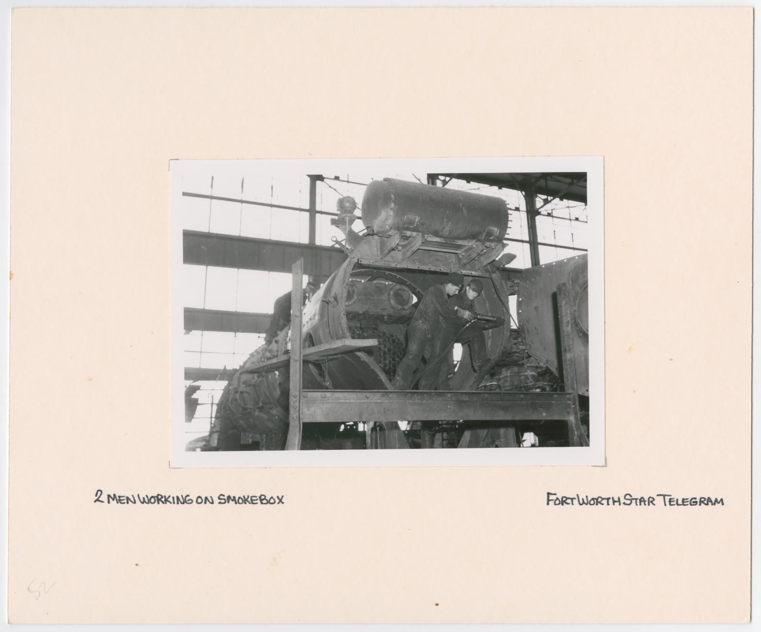 Men Constructing Train Smokebox