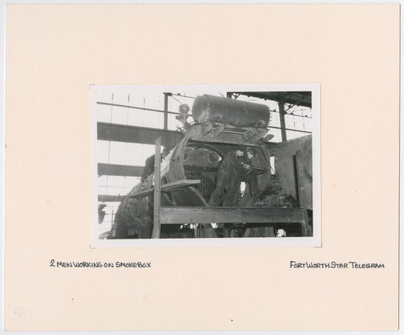 Men Constructing Train Smokebox