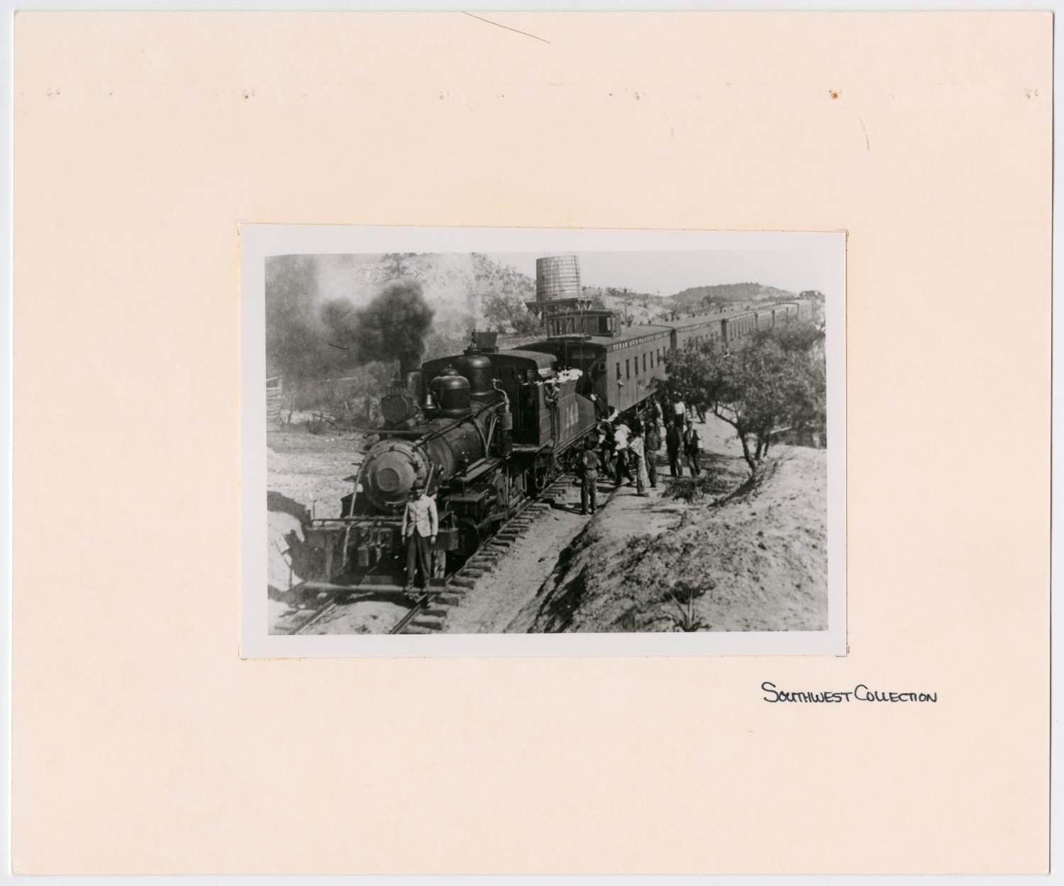 T&P Train #144 With Group of Men