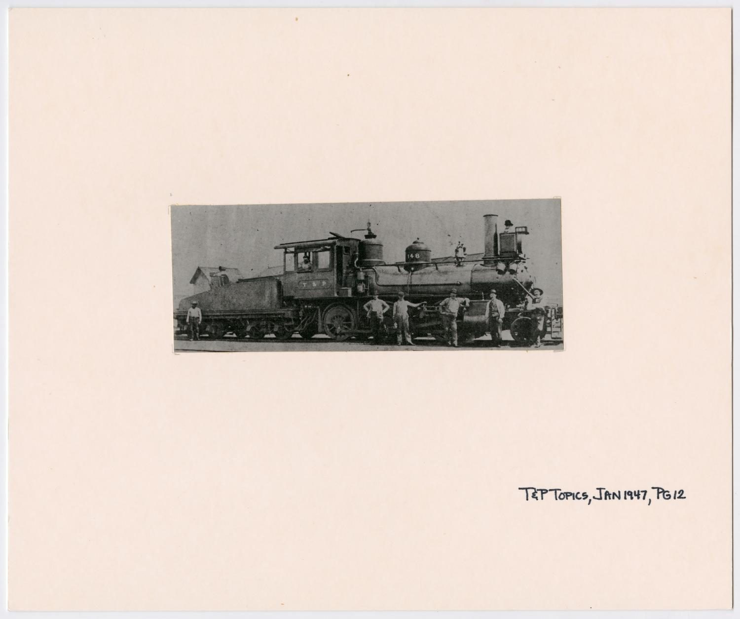 Men Standing by Train #148