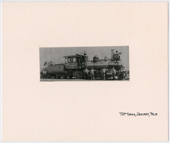 Men Standing by Train #148