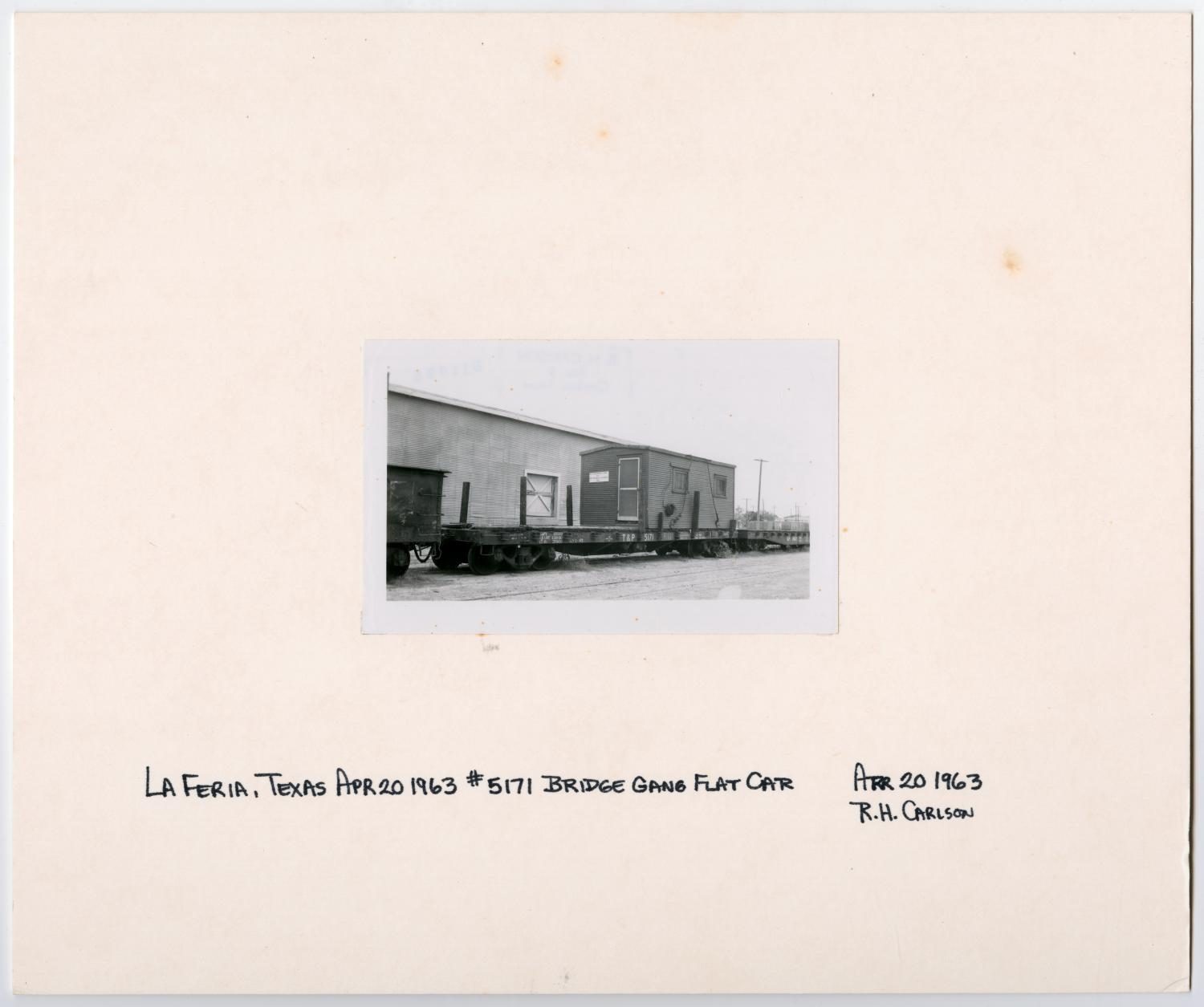 Small Trailer on a Flat Car