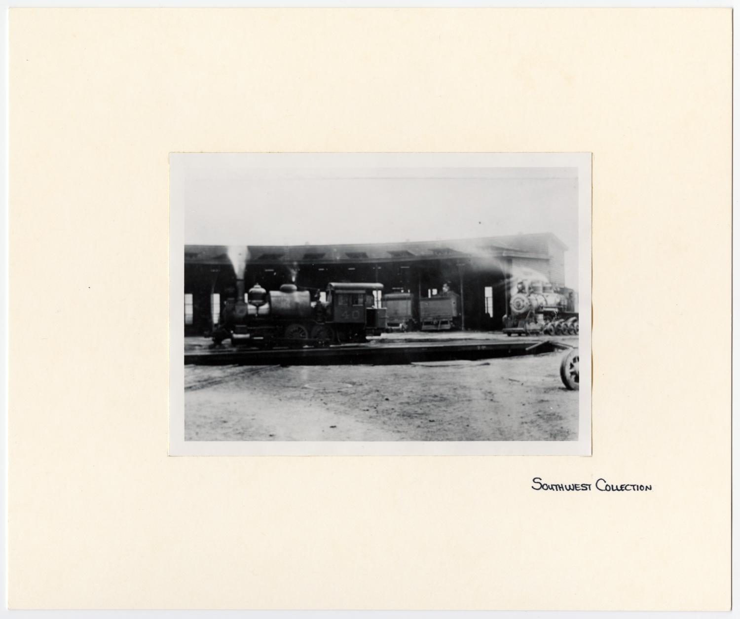 Train #40 in Front of a Roundhouse