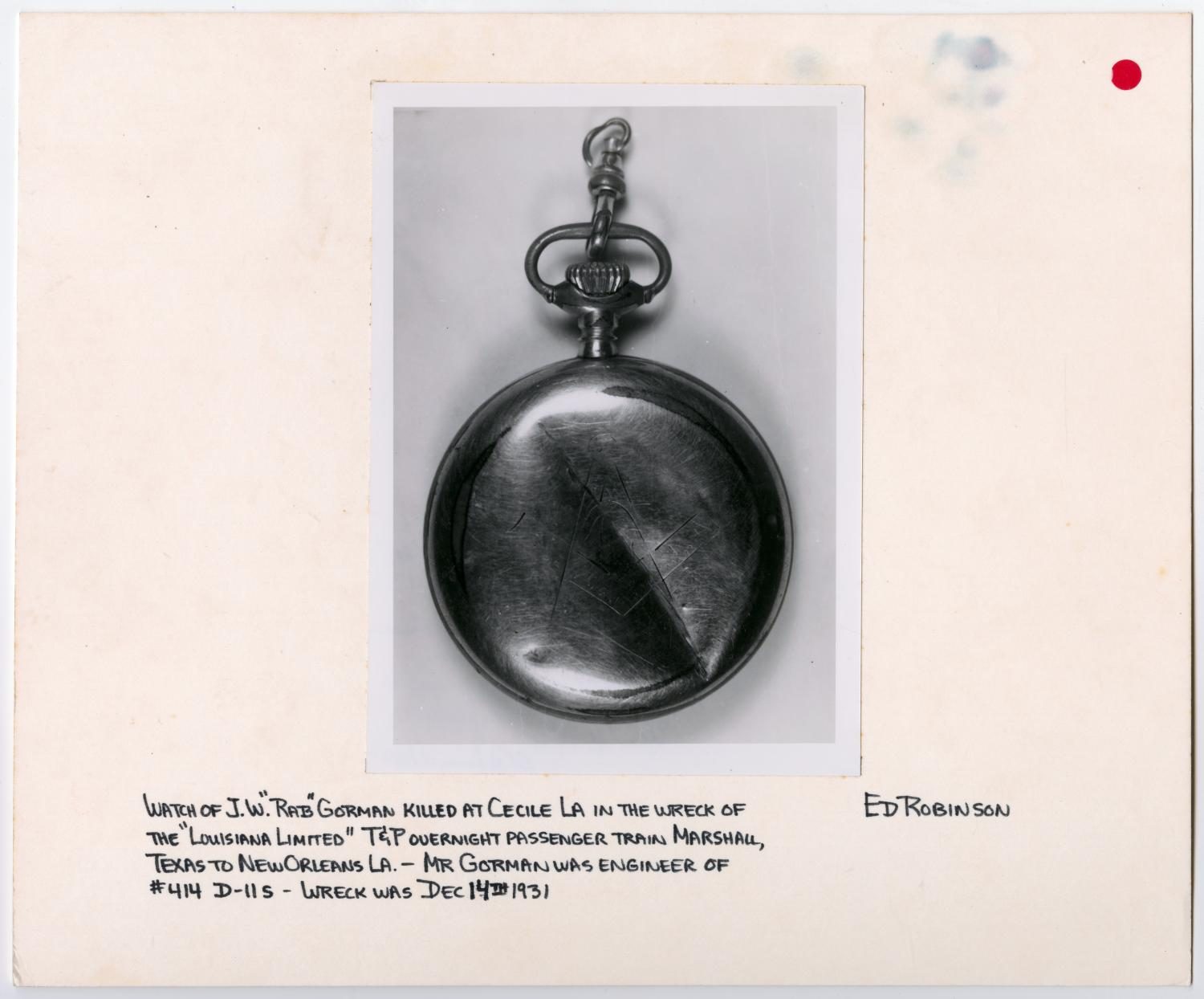 Back of a Pocket Watch Pulled From a Train Wreck