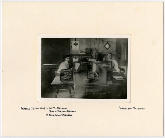 Two Men at a Desk