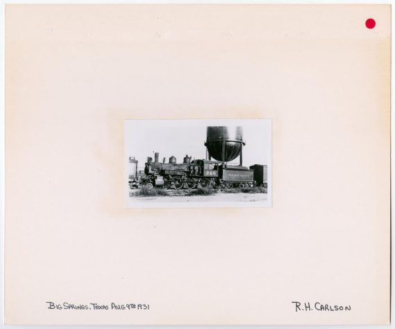 T&P Train #256 in Front of a Water Tower 2